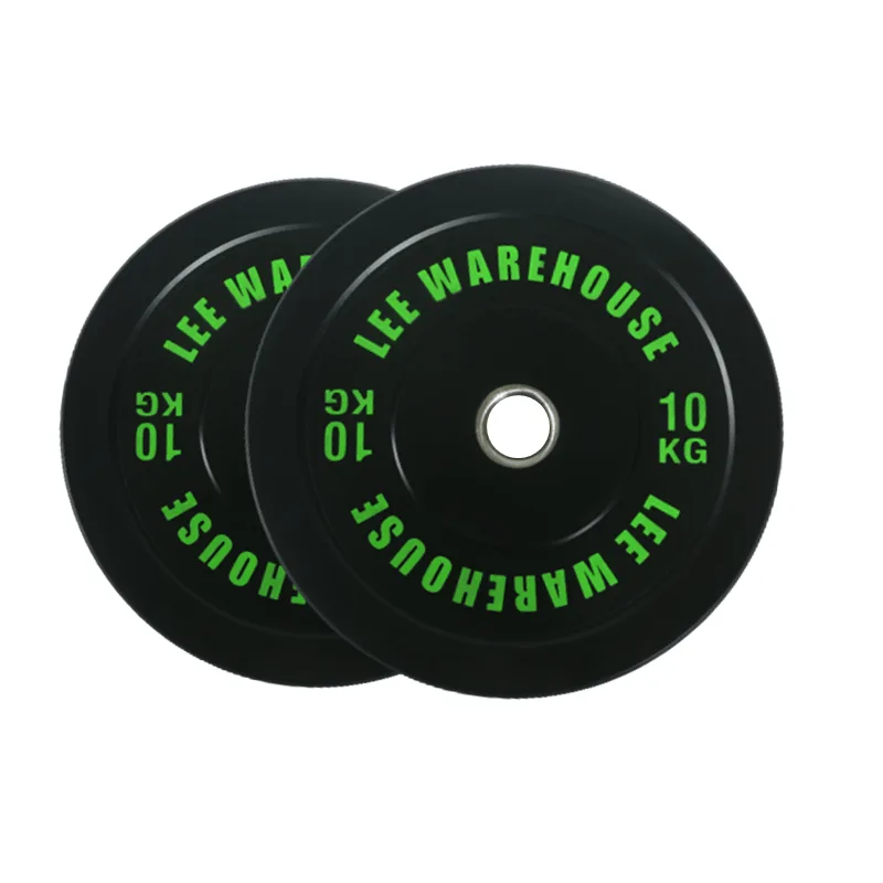 Two black 10 kg weight plates with green text.