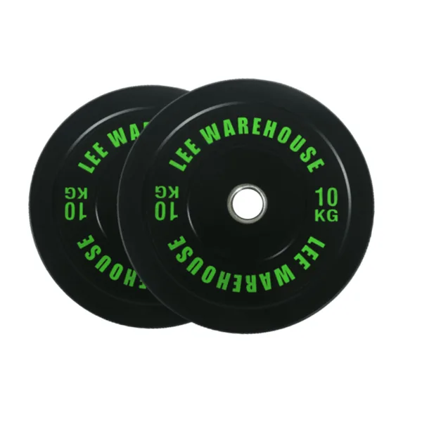 Two black 10 kg weight plates with green text.