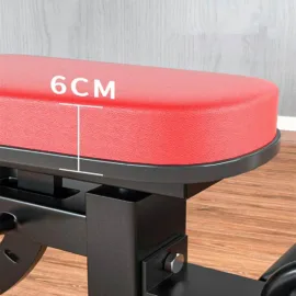 Red bench seat with 6cm thickness measurement, wooden floor background.