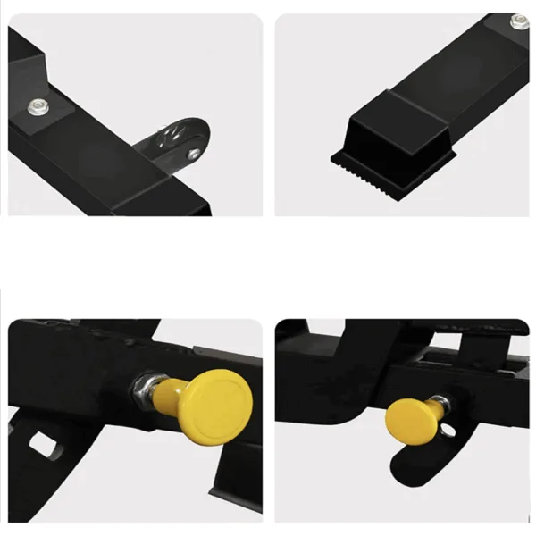 Close-up of black metal parts with yellow knobs on machinery.