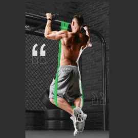 A man working out on a green resistance band