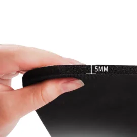 Close-up of a 5mm thick yoga mat, emphasizing its thickness for comfort and support.