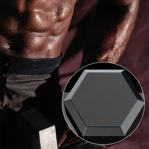 A man lifting a Hexagon shaped black dumbbell