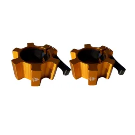 A pair of yellow olympic barbell collars