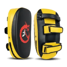 A yellow kick pad used for martial arts training.