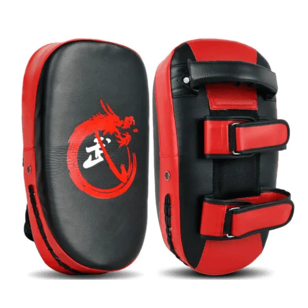 A red kick pad used for martial arts training.